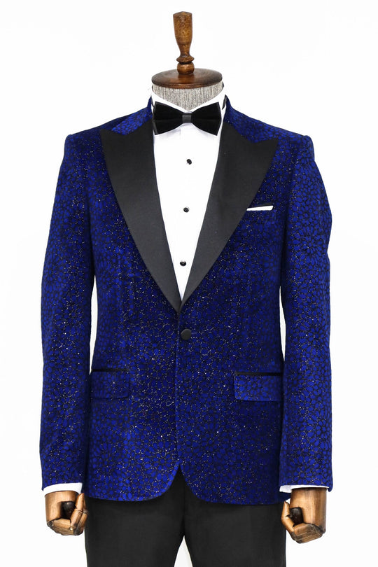 Blue tuxedo jacket with black lapels on a mannequin against a white background