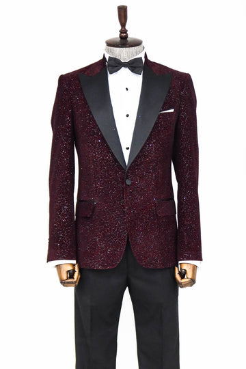 Burgundy tuxedo with black lapels on a mannequin against a white background
