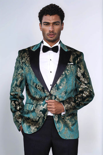 Man wearing a patterned tuxedo jacket with a white shirt and black bow tie on a white background