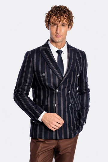 Man wearing a striped suit jacket and tie on a white background