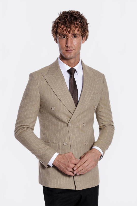 Man wearing a beige checkered suit with a white shirt and brown tie on a white background