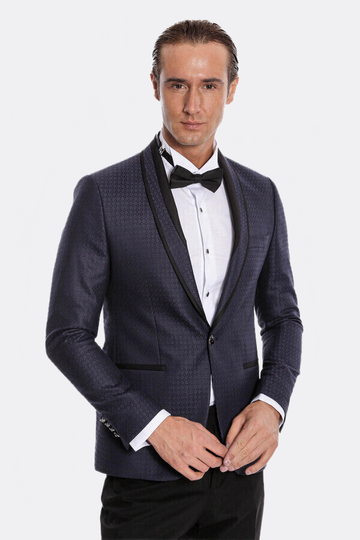 Man wearing a formal navy suit with a bow tie on a white background